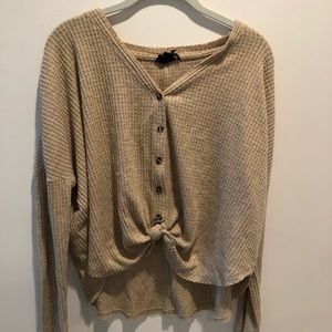 beige knit top from URBAN OUTFITTERS